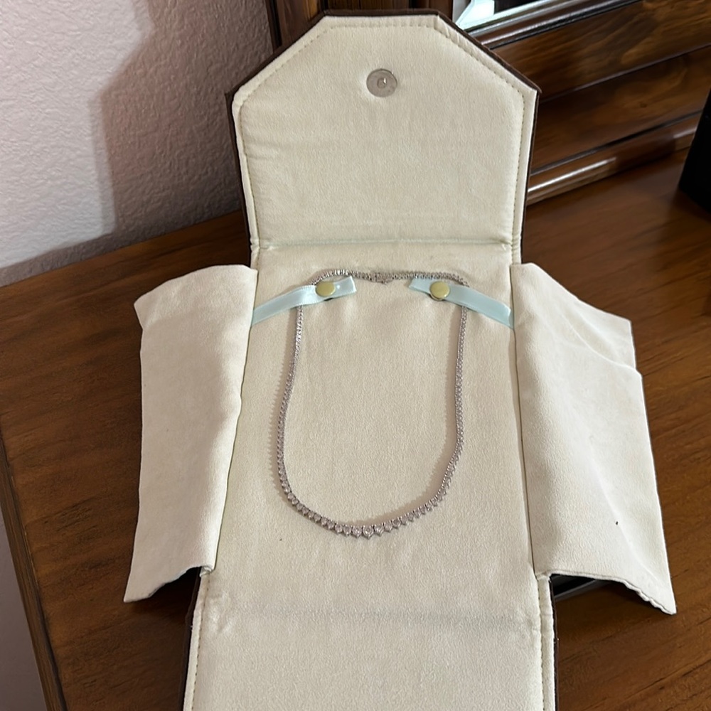 Silver diamond necklace. 16 inches